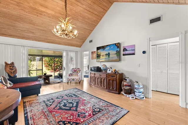 a living room with furniture and a table