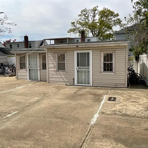 a front view of a house with a garage