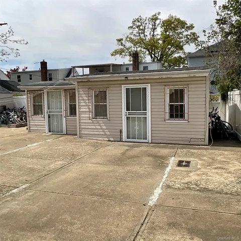 a front view of a house with a garage