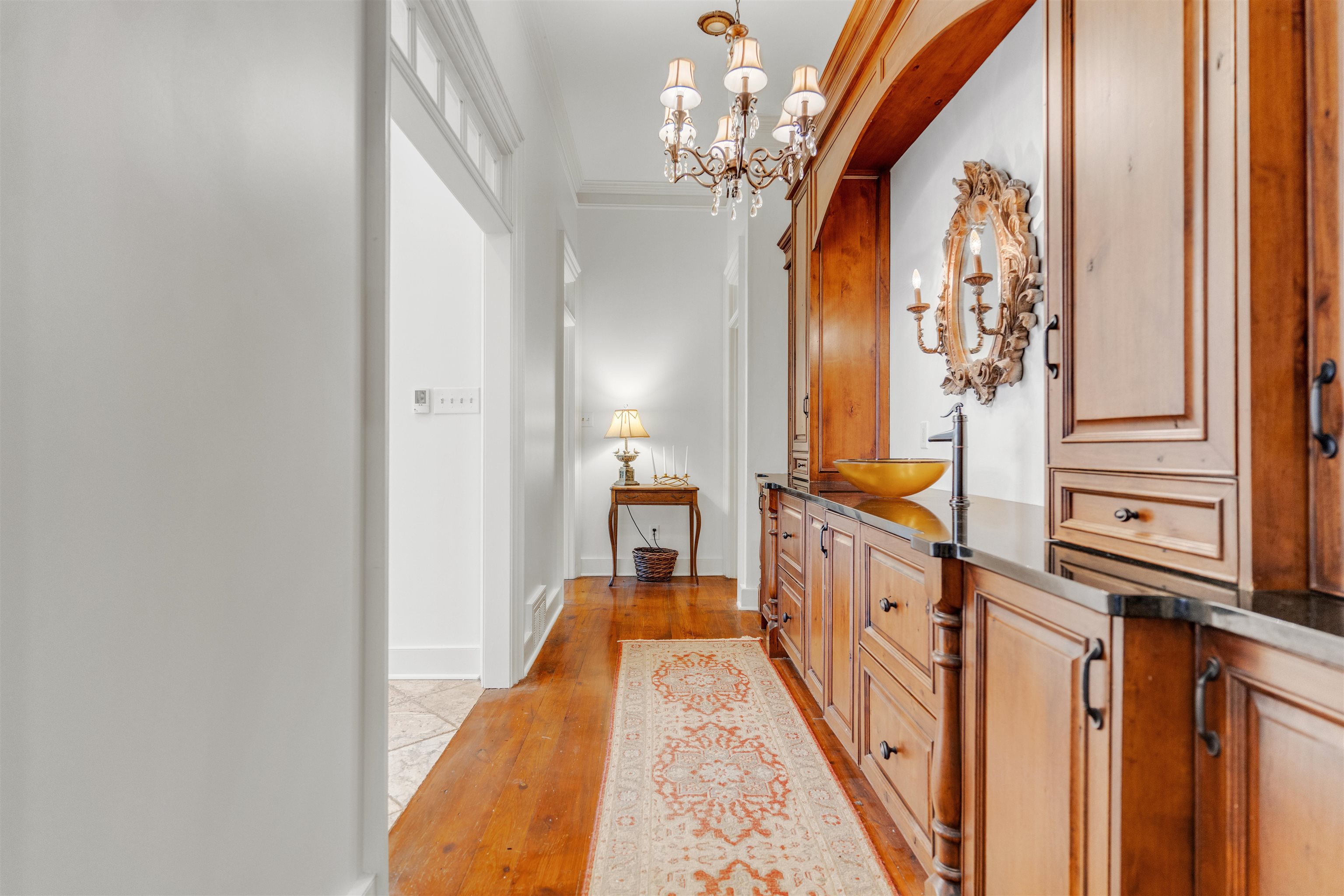 2665 Raleigh Lagrange Drive Piperton, TN 38066 - Photo 16 of 40 a view of a hallway with wooden floor and staircase
