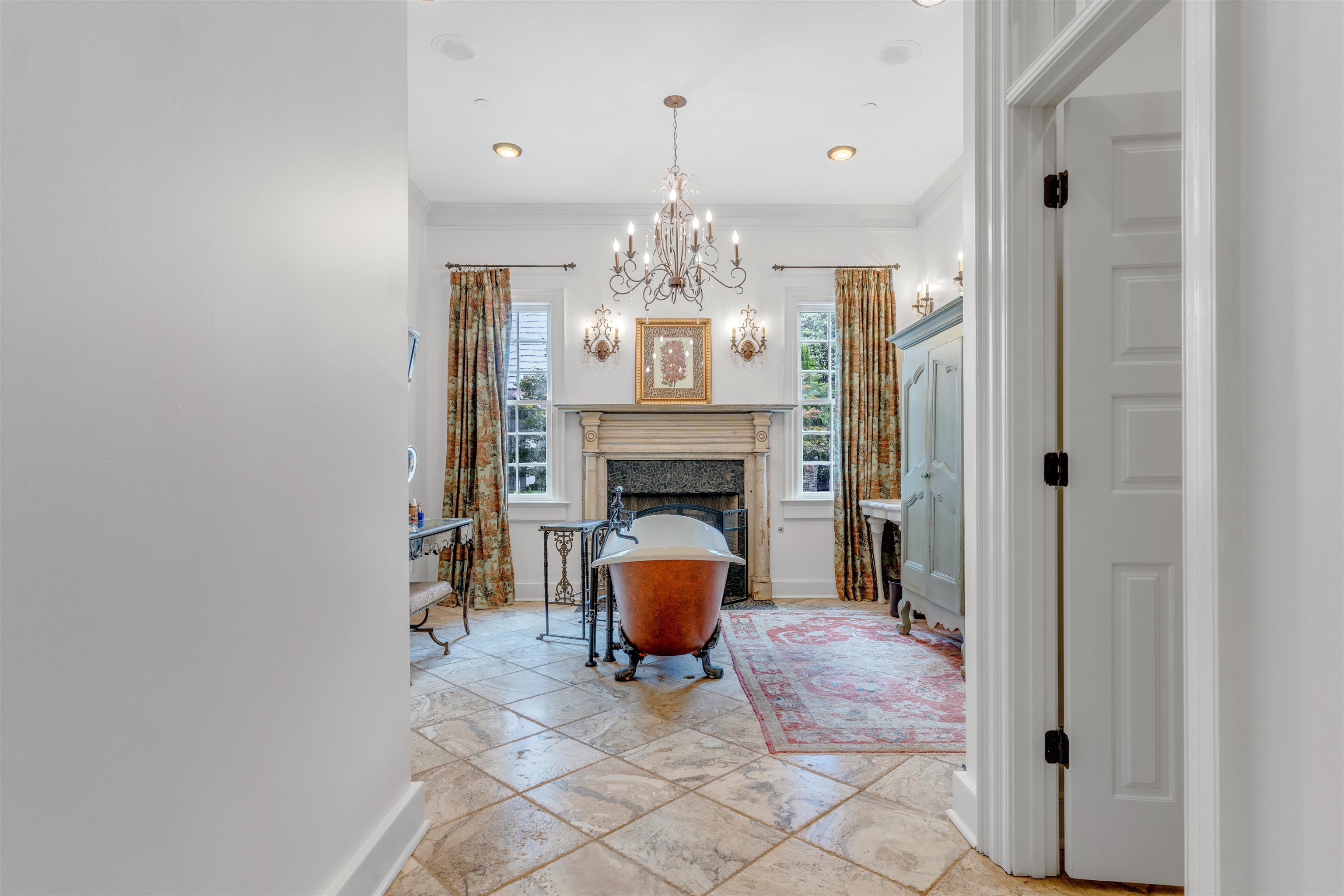 2665 Raleigh Lagrange Drive Piperton, TN 38066 - Photo 17 of 40 a hallway with fireplace and chandelier