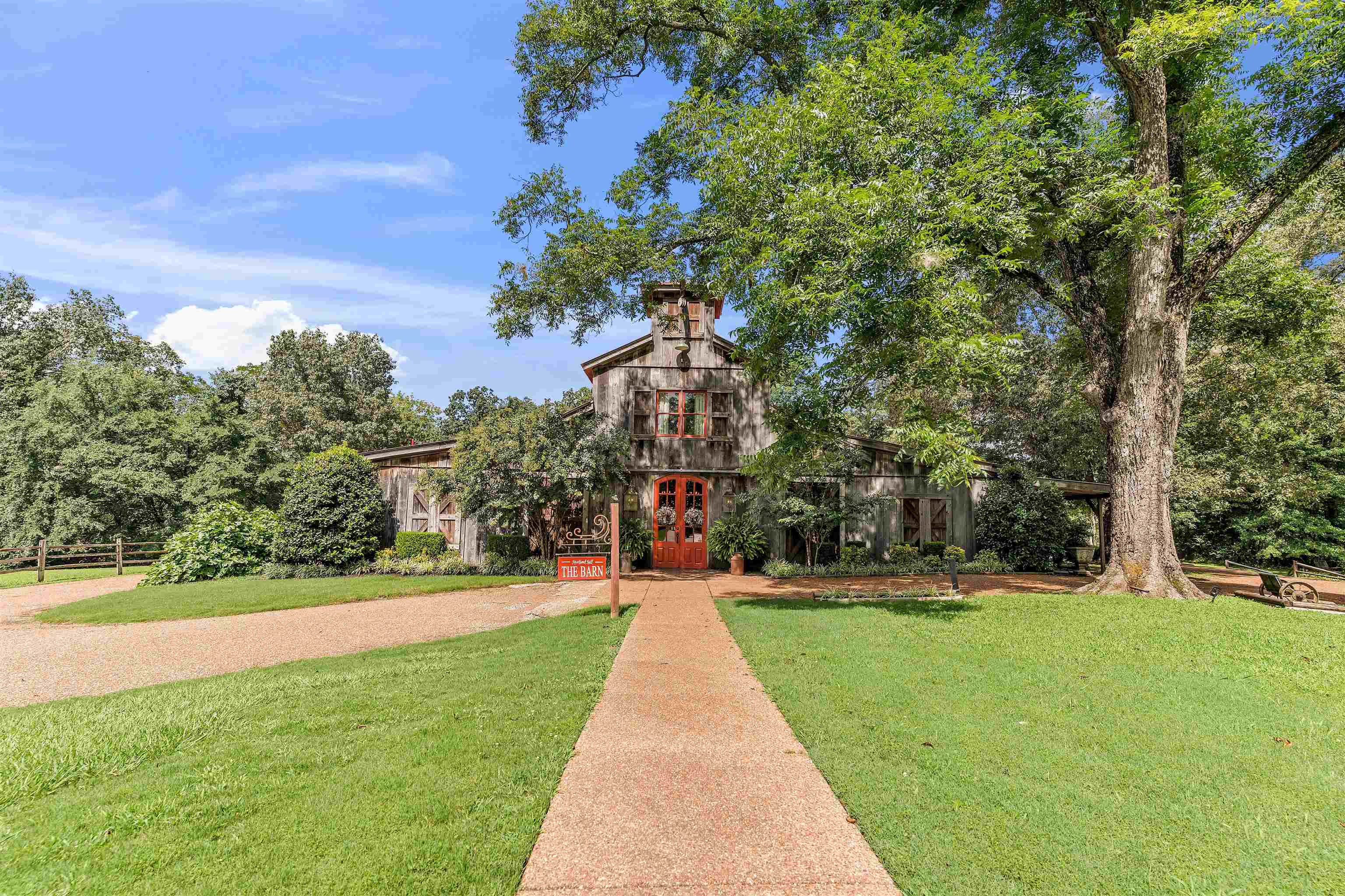 2665 Raleigh Lagrange Drive Piperton, TN 38066 - Photo 31 of 40 a front view of a house with a yard and fountain in middle