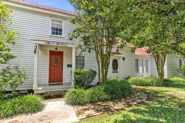 a view of a garden with a fountain