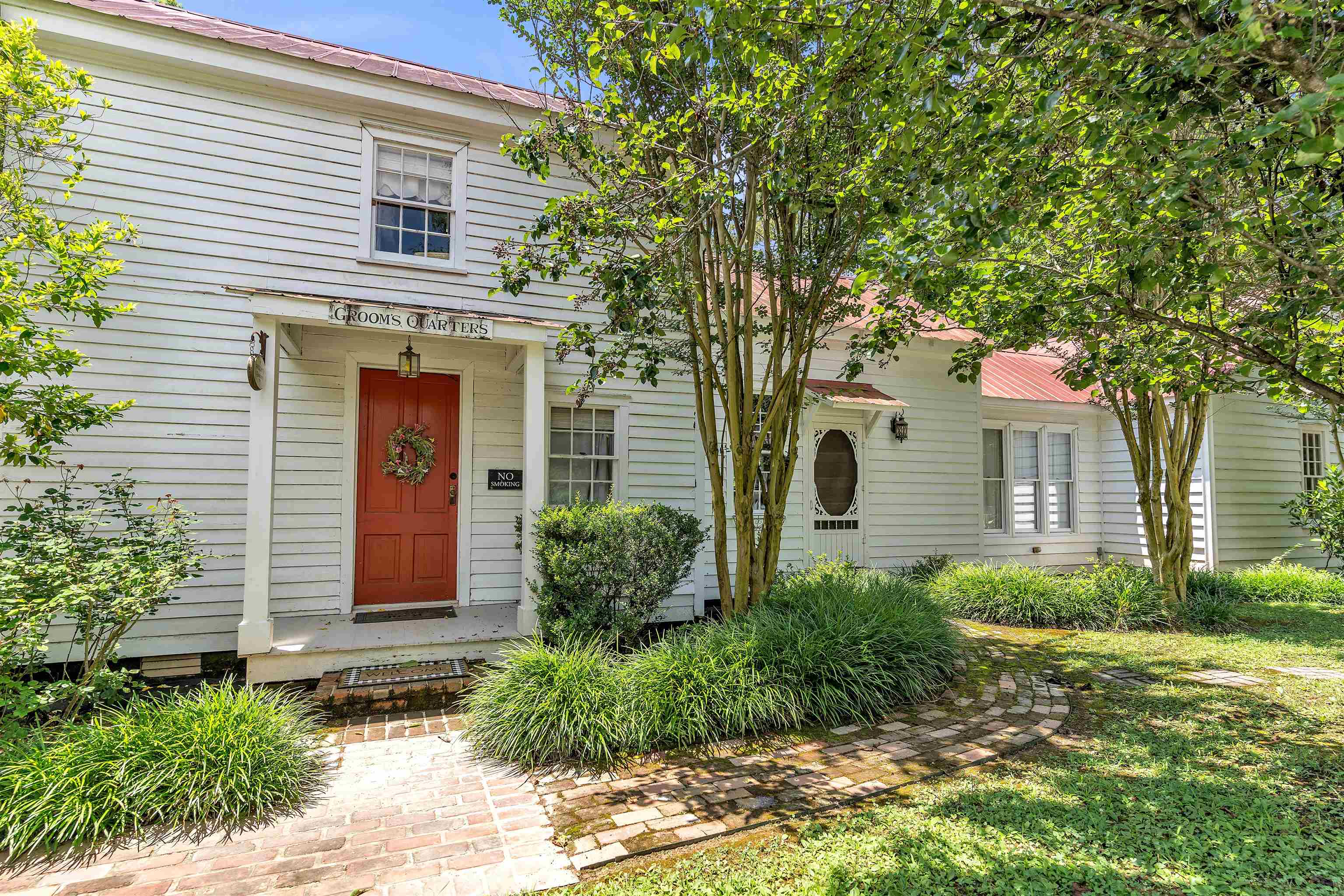 2665 Raleigh Lagrange Drive Piperton, TN 38066 - Photo 35 of 40 a front view of a house with garden