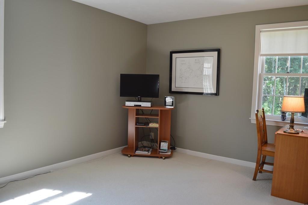 9 Windmill Hill Road Stow, MA 01775 - Photo 14 of 22 a view of a workspace with furniture and a window