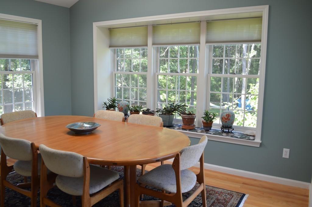 9 Windmill Hill Road Stow, MA 01775 - Photo 6 of 22 a dining room with furniture and window