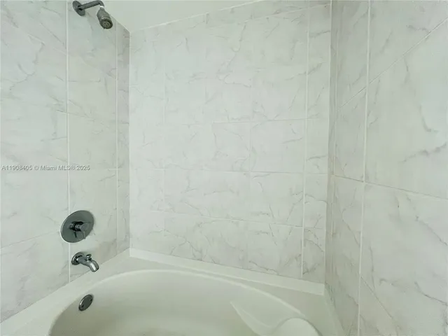 a bathroom with a bathtub