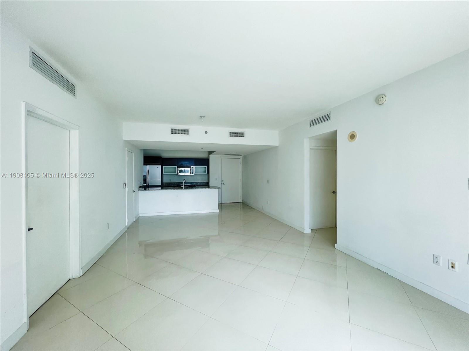 951 Brickell Avenue, Unit 2407 Miami, FL 33131 - Photo 6 of 19 a view of an empty room