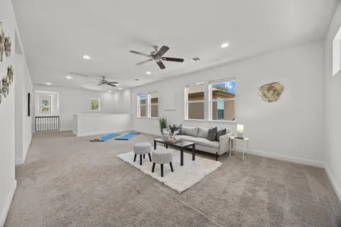 a living room with furniture and window