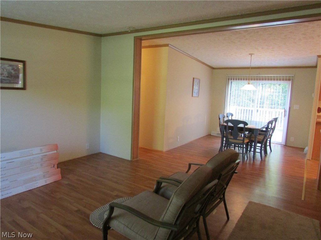 1220 Way Road Rome, OH 44085 - Photo 8 of 25 Front living room, open layout into the dining room. Airy and open feel!