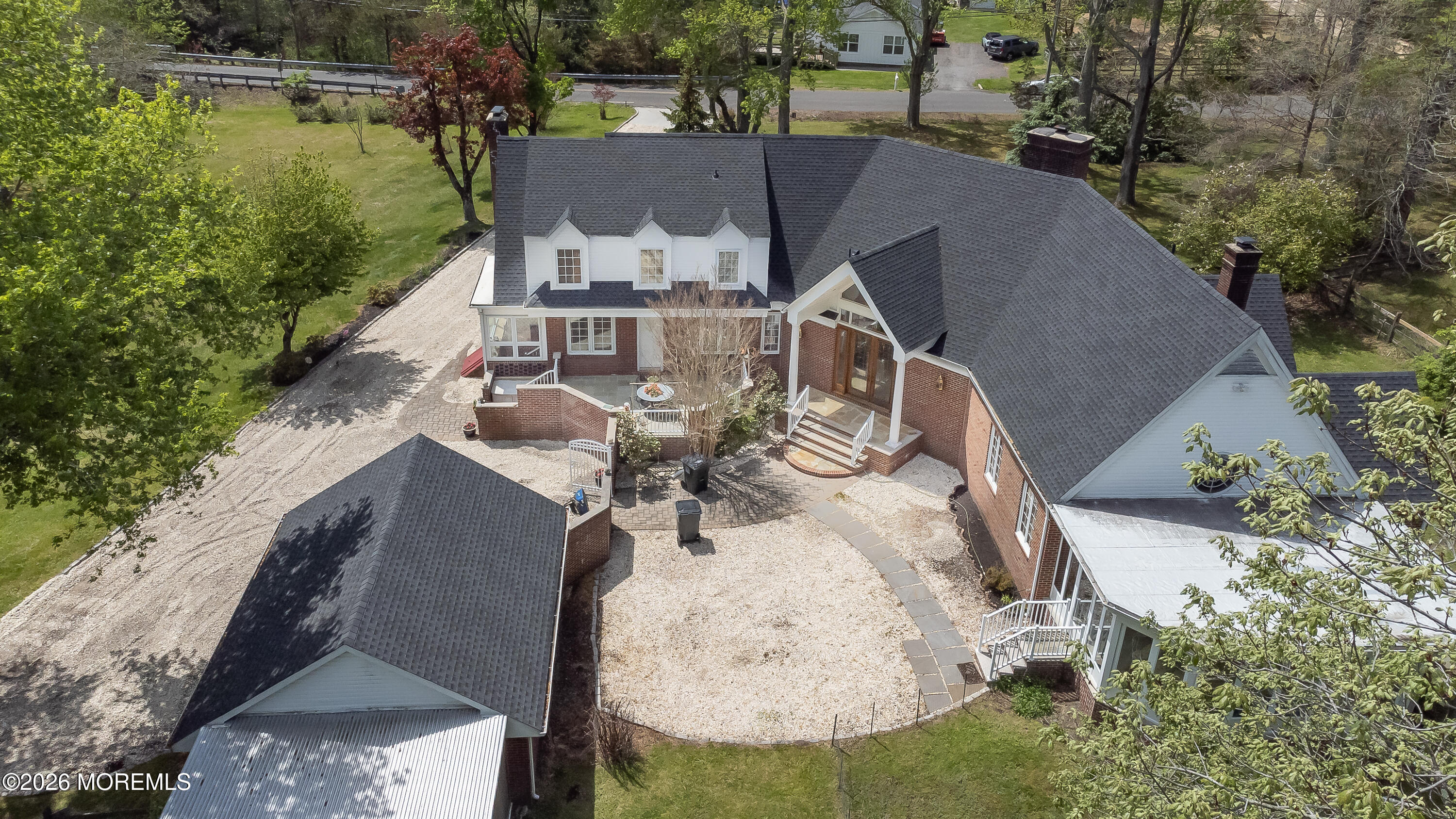 187 Hockhockson Road Colts Neck, NJ 07722 - Photo 4 of 55 an aerial view of a house with outdoor space and lake view