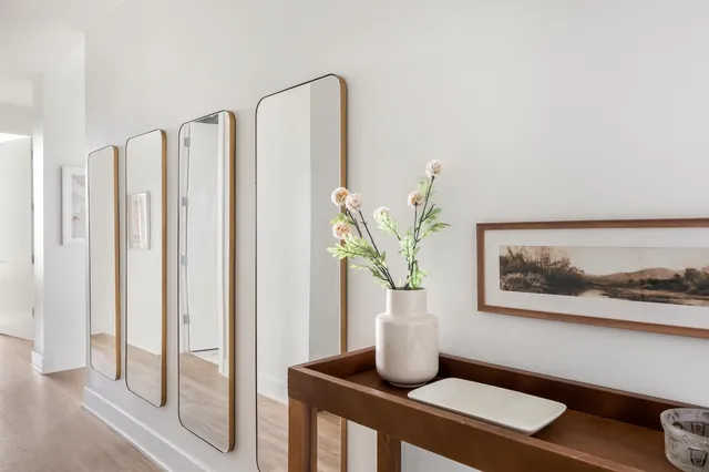 a vase with flowers on a table