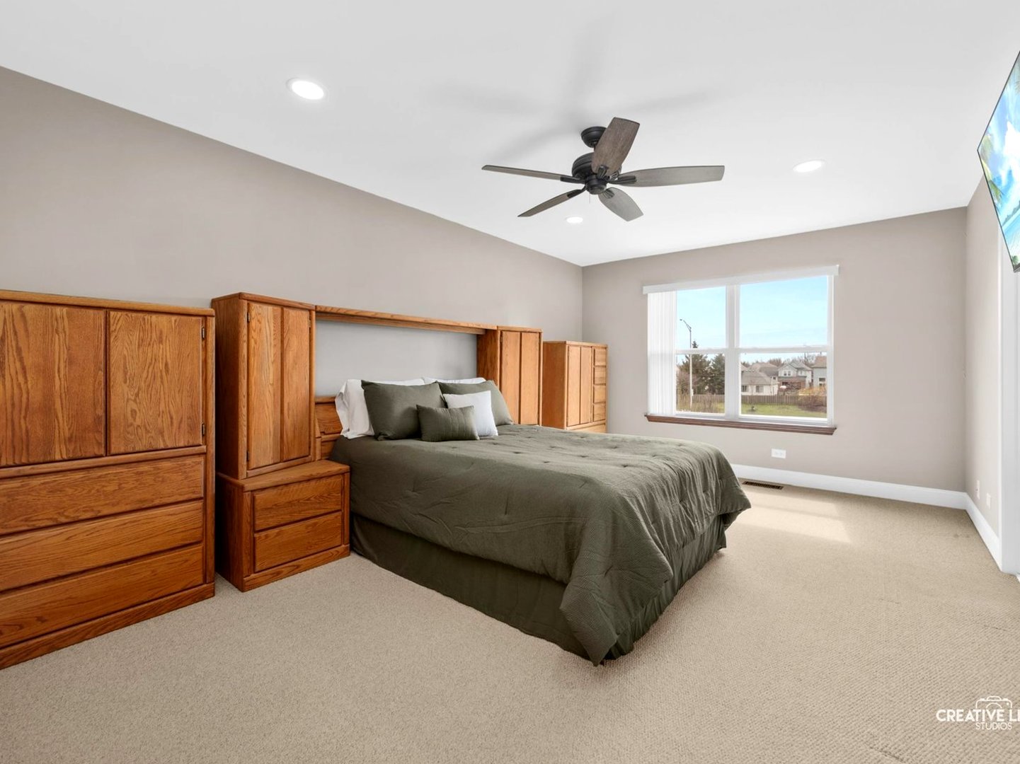 1524 West Mooseheart Road North Aurora, IL 60542 - Photo 11 of 32 a spacious bedroom with a bed and a window