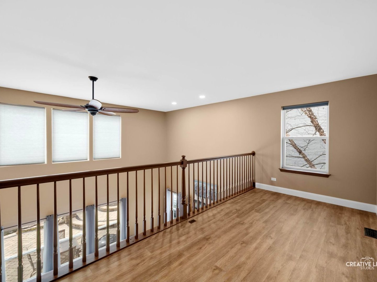 1524 West Mooseheart Road North Aurora, IL 60542 - Photo 15 of 32 a view of an empty room with wooden floor and a window