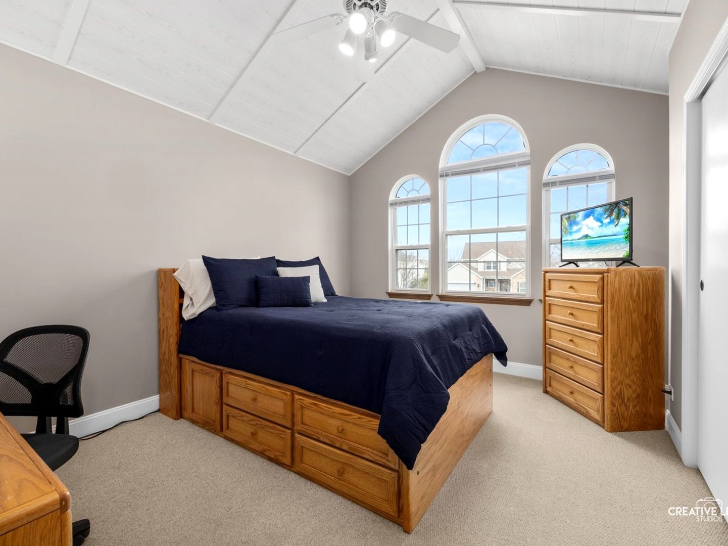 1524 West Mooseheart Road North Aurora, IL 60542 - Photo 20 of 32 a spacious bedroom with a bed and window