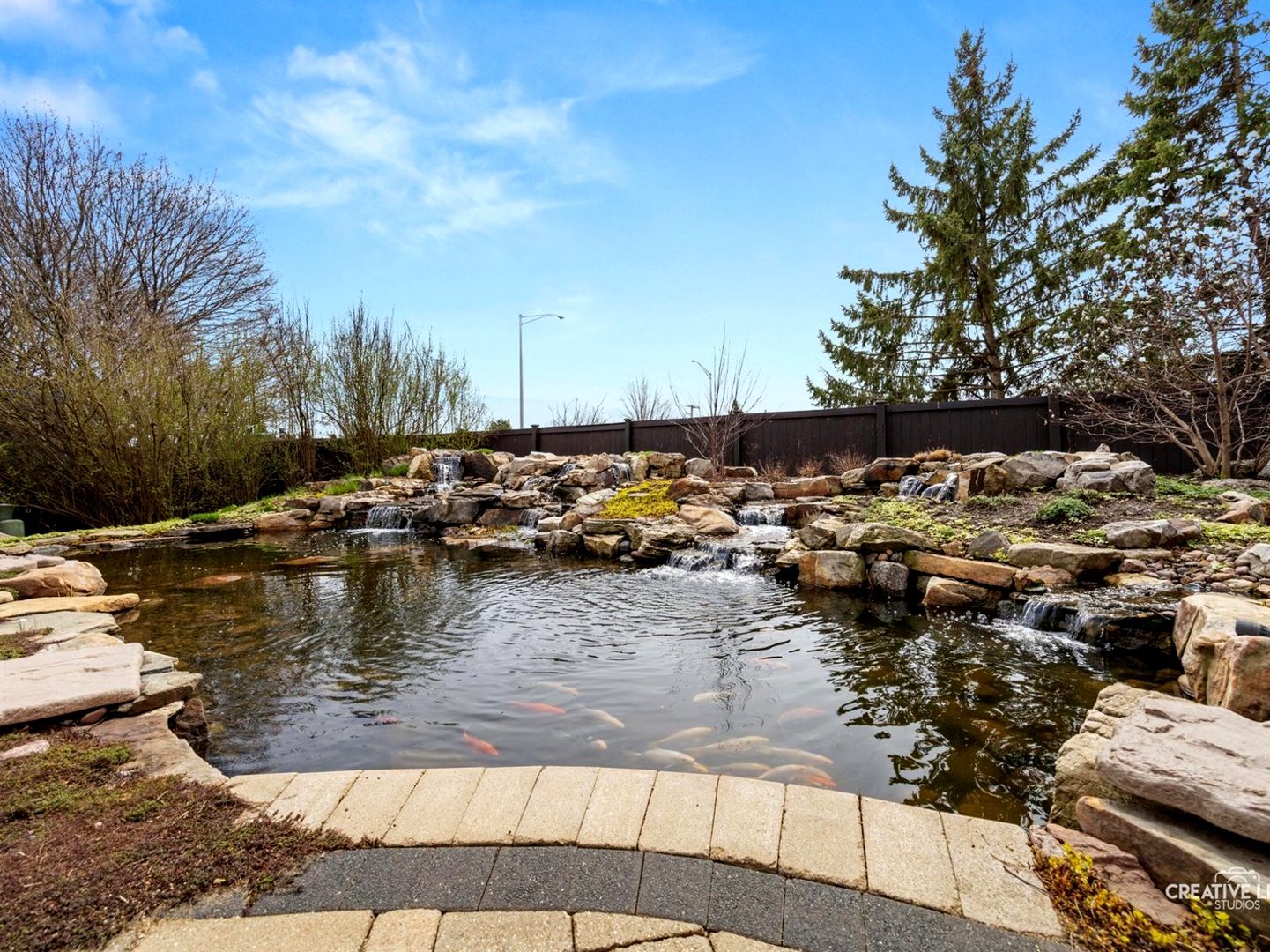 1524 West Mooseheart Road North Aurora, IL 60542 - Photo 23 of 32 a view of water with boats and trees in the background