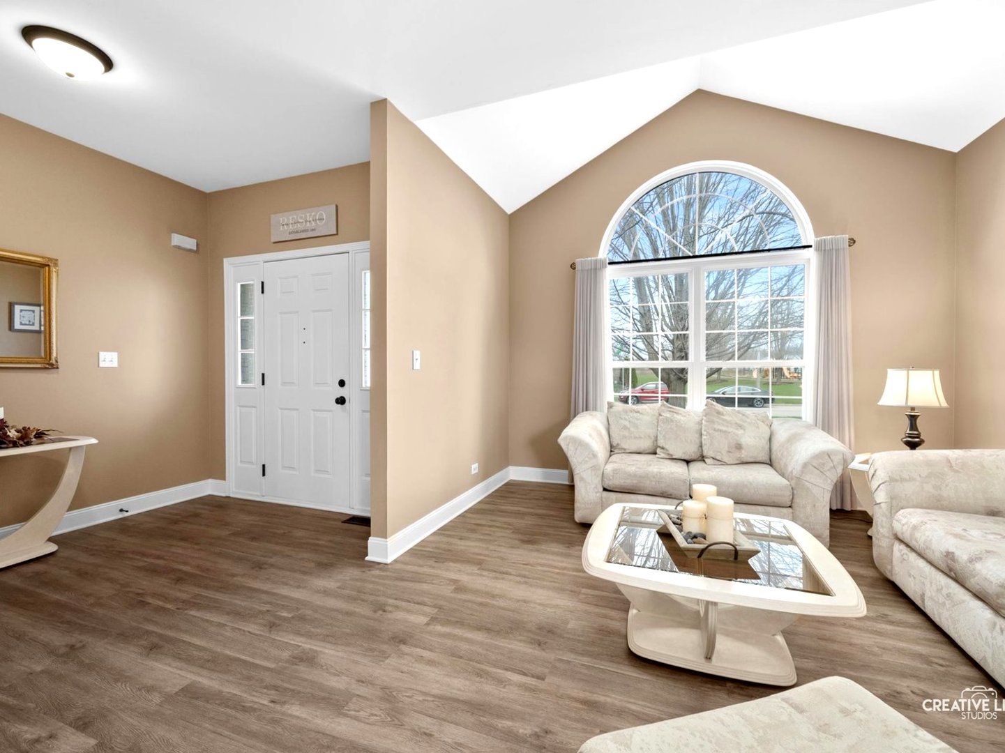 1524 West Mooseheart Road North Aurora, IL 60542 - Photo 3 of 32 a living room with furniture and a window