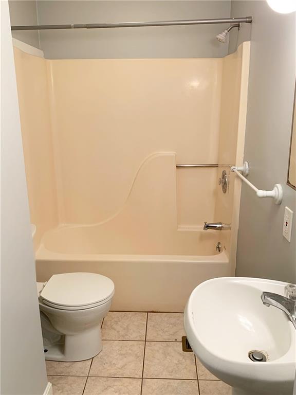 5144 Butler Street Pittsburgh, PA 15201 - Photo 12 of 20 a bathroom with a sink a toilet and shower