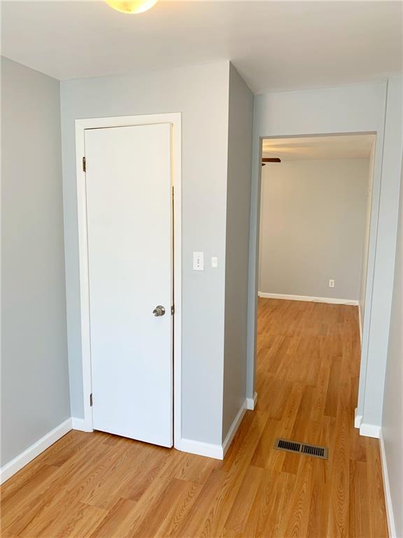 5144 Butler Street Pittsburgh, PA 15201 - Photo 10 of 20 a view of a room with wooden floor