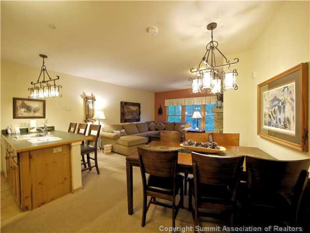 195 River Run Road, Unit 8005 Keystone, CO 80435 - Photo 1 of 12 a view of a dining room with furniture window and wooden floor