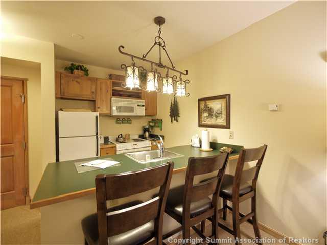 195 River Run Road, Unit 8005 Keystone, CO 80435 - Photo 3 of 12 a view of a dining room with furniture
