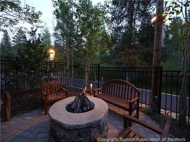 195 River Run Road, Unit 8005 Keystone, CO 80435 - Photo 7 of 12 a view of a patio with a table chairs and a potted plant