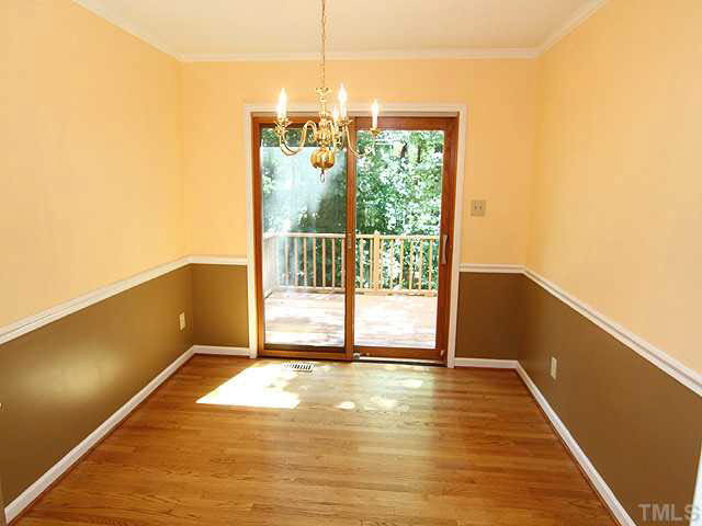 5304 Middleton Road Durham, NC 27713 - Photo 6 of 16 Separate dining room features hardwood floors, chair rail and easy access to deck outside. Just bring the kabobs straight from the grill to the table! Dining Room
