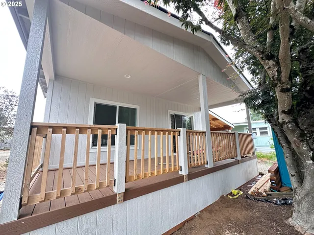 a view of staircase with wooden floor and fence