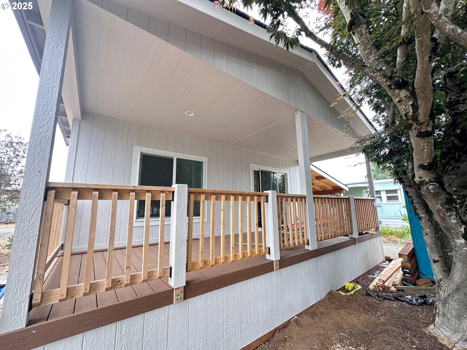 11316 Northeast 28th Street, Unit 3 Vancouver, WA 98682 - Photo 2 of 18 a view of staircase with wooden floor and fence