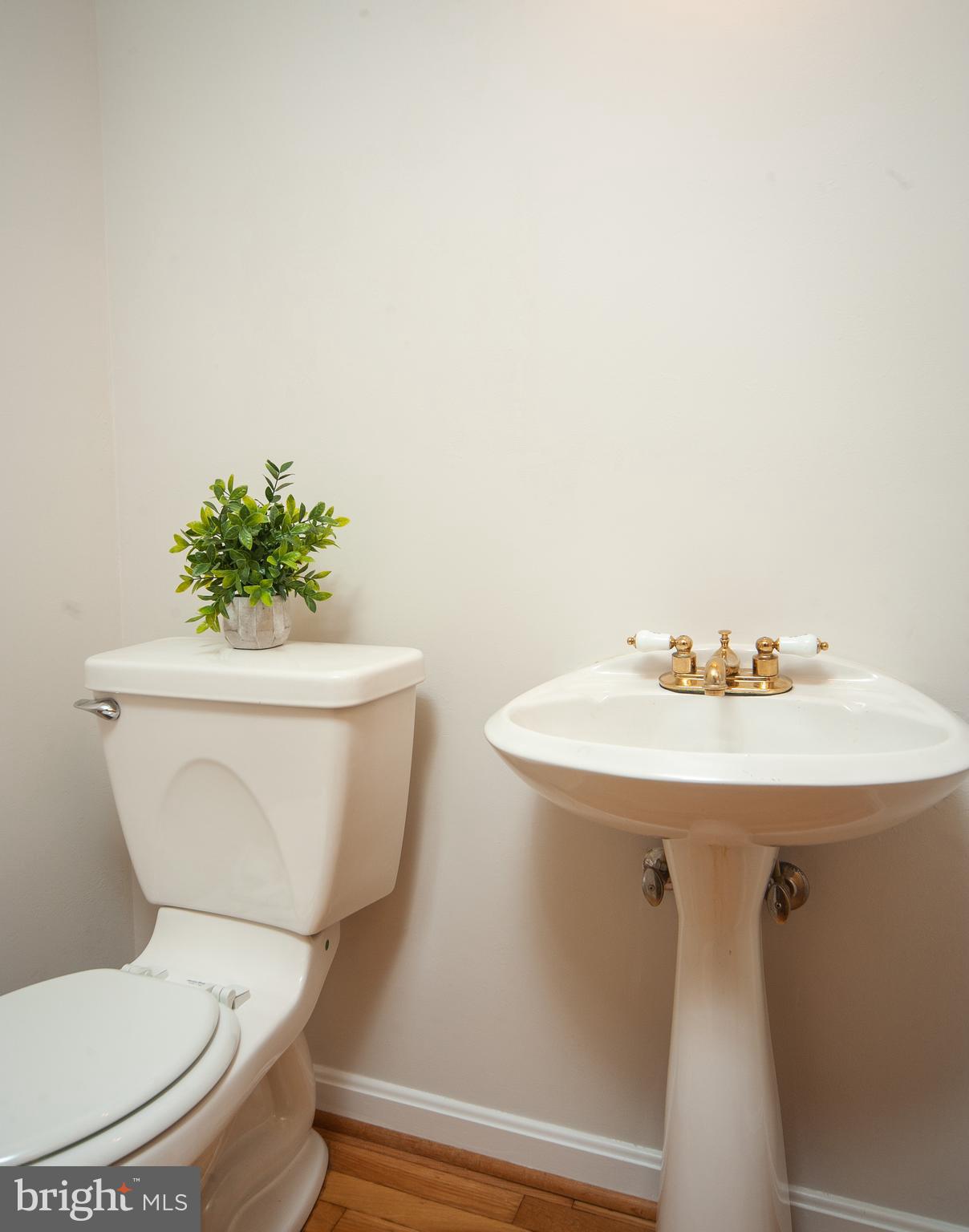 9624 Rocksparkle Row Columbia, MD 21045 - Photo 12 of 25 Powder room on main floor.
