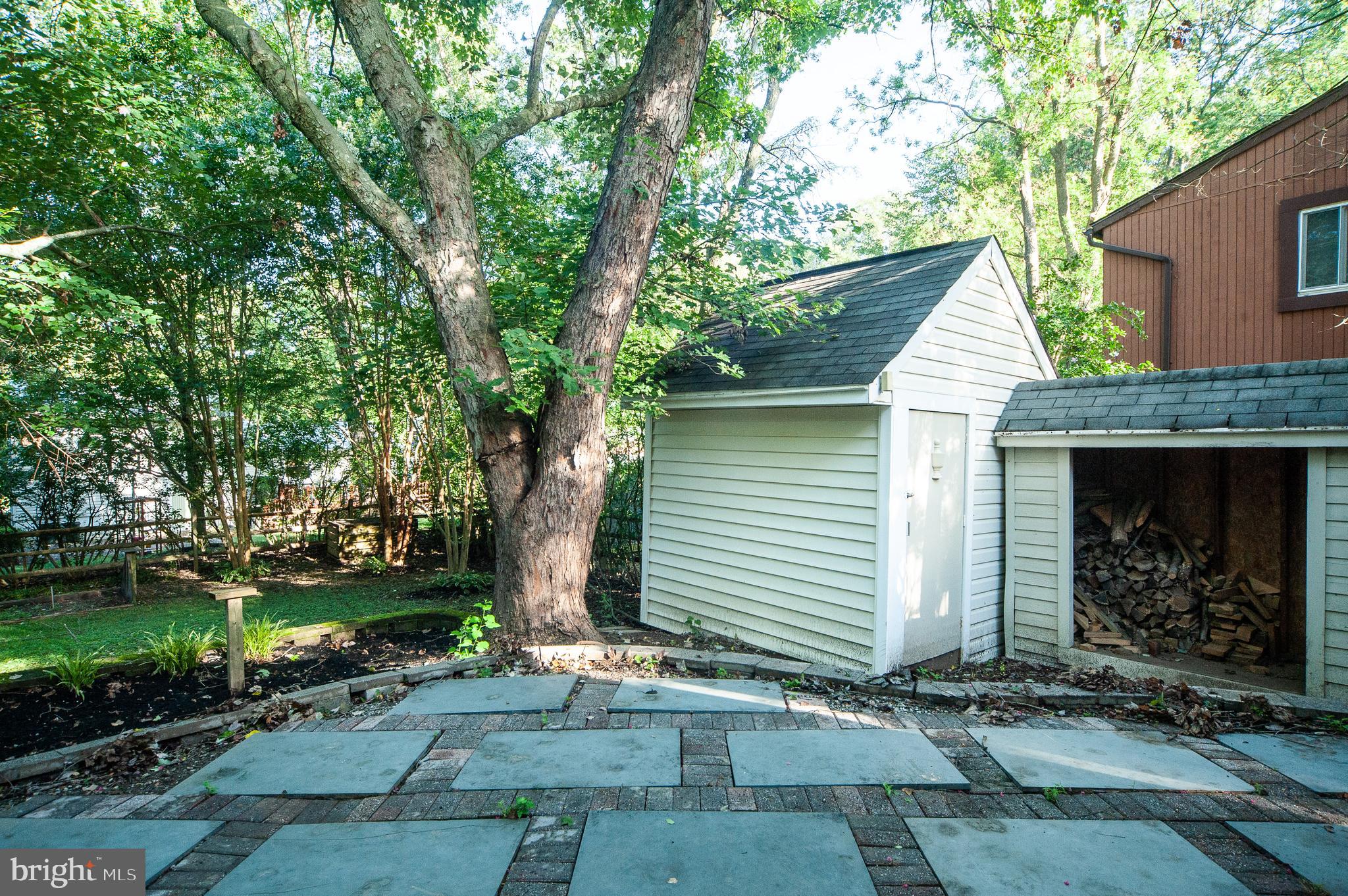 9624 Rocksparkle Row Columbia, MD 21045 - Photo 21 of 25 Tool Shed and Wood Shed.
