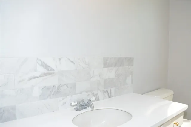 a bathroom with a sink and a bathtub