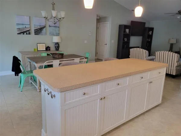 a room with a dresser and a mirror