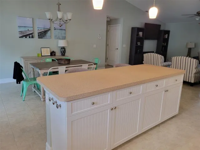 a room with a dresser and a mirror