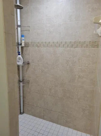 a view of a backyard with a swimming pool