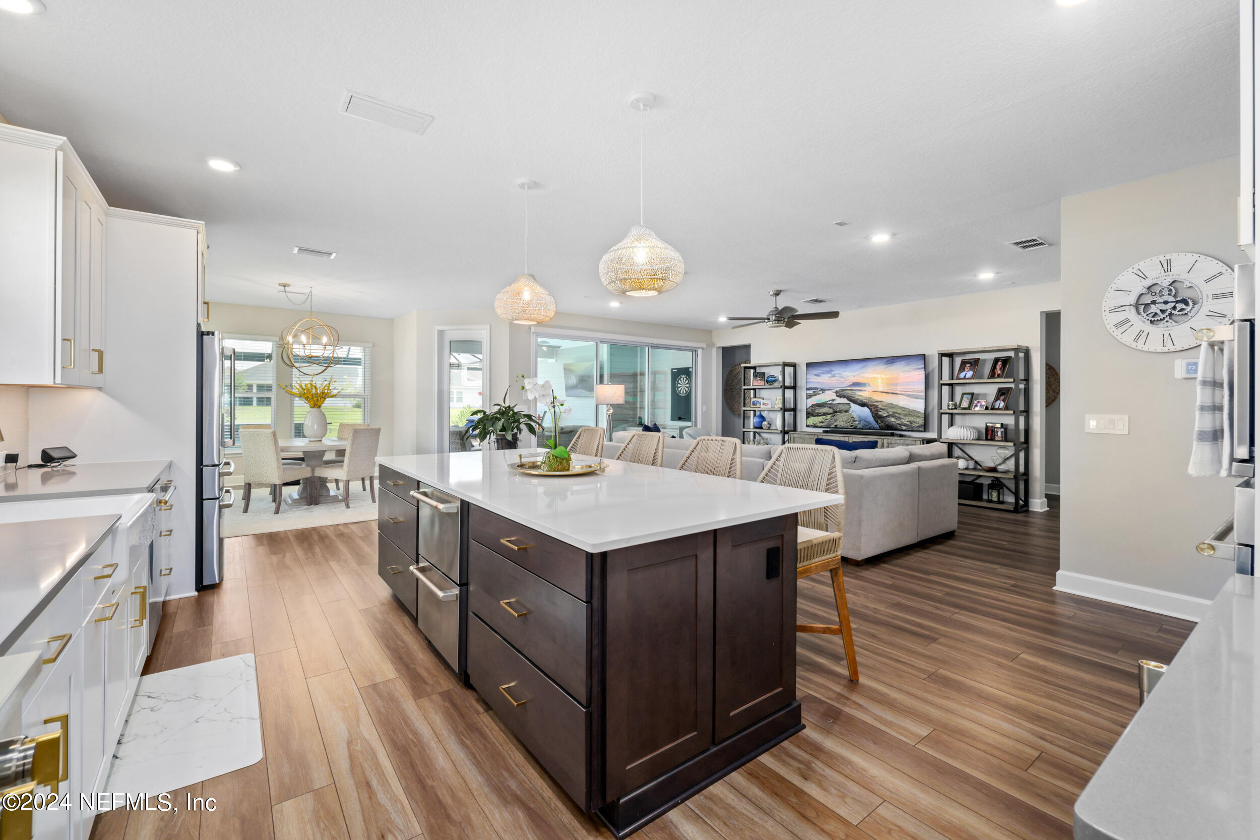 98 Sumter Pl Street St. Augustine, FL 32092 - Photo 14 of 84 a kitchen with wooden cabinets and center island