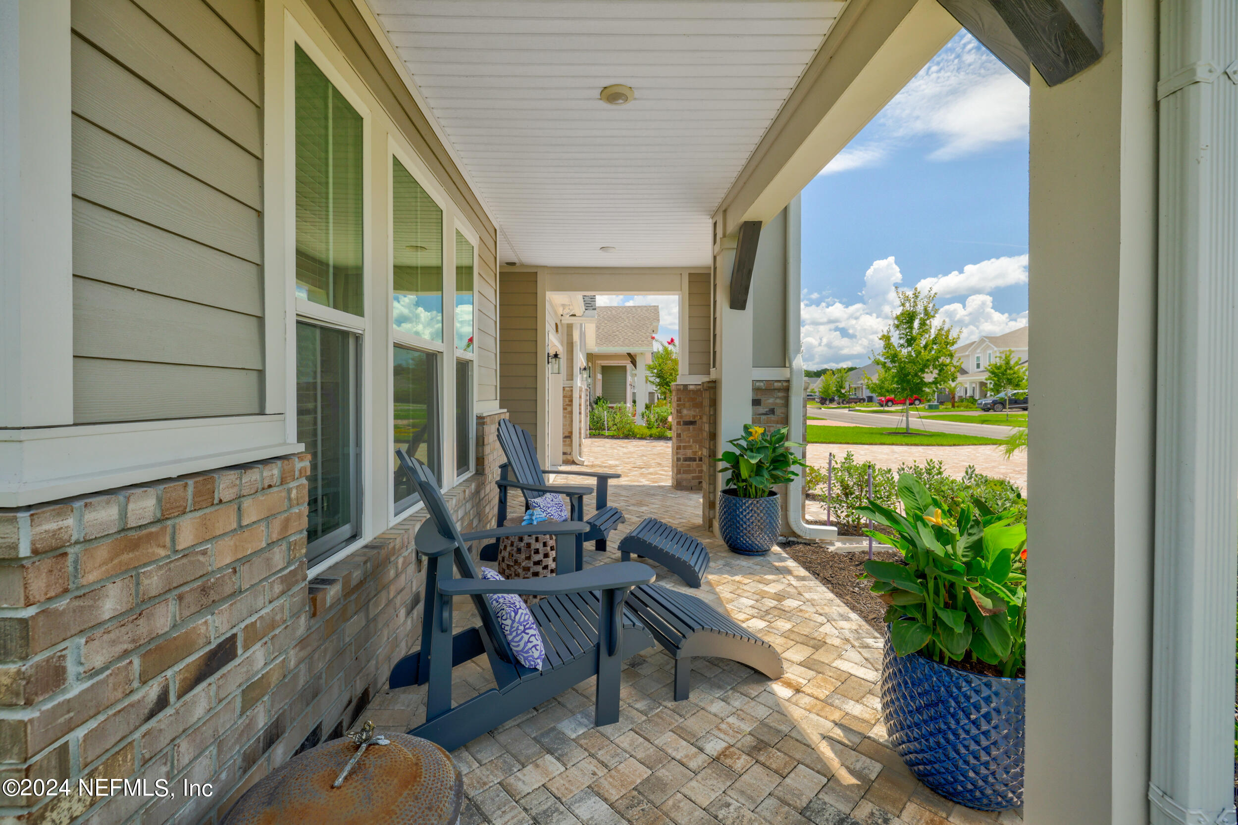 98 Sumter Pl Street St. Augustine, FL 32092 - Photo 2 of 84 a balcony with furniture and flowers