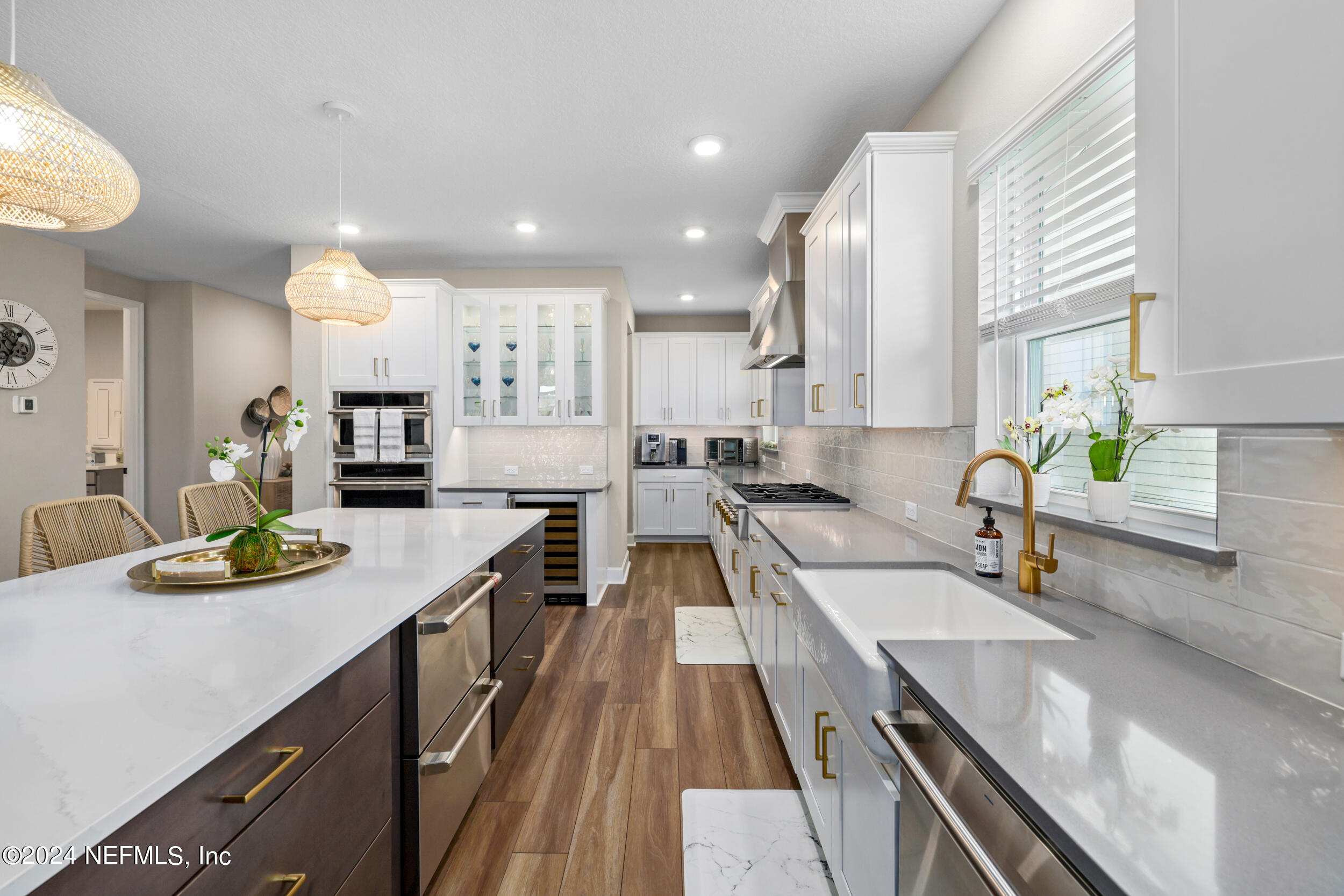 98 Sumter Pl Street St. Augustine, FL 32092 - Photo 21 of 84 a kitchen with kitchen island granite countertop a sink a counter top space and stainless steel appliances