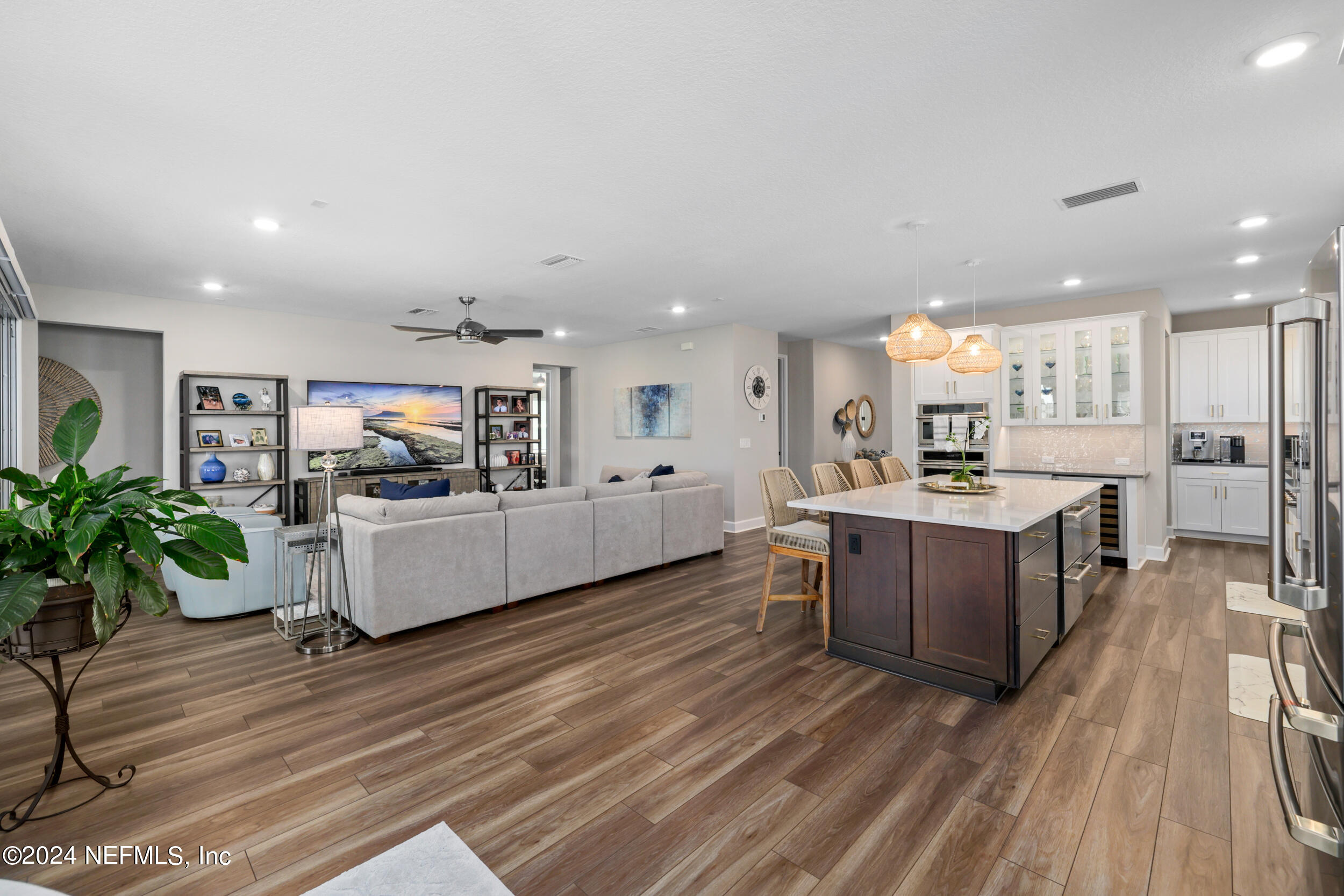 98 Sumter Pl Street St. Augustine, FL 32092 - Photo 25 of 84 a large white kitchen with lots of counter space a sink and appliances