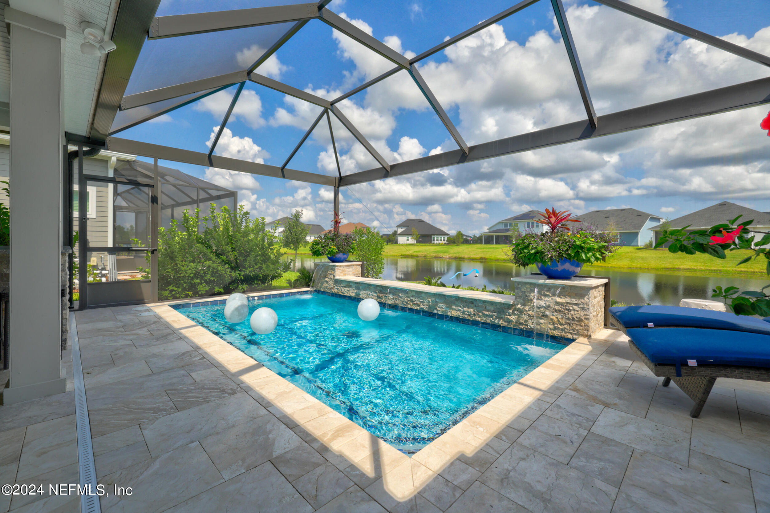 98 Sumter Pl Street St. Augustine, FL 32092 - Photo 42 of 84 a view of a chairs and table in backyard