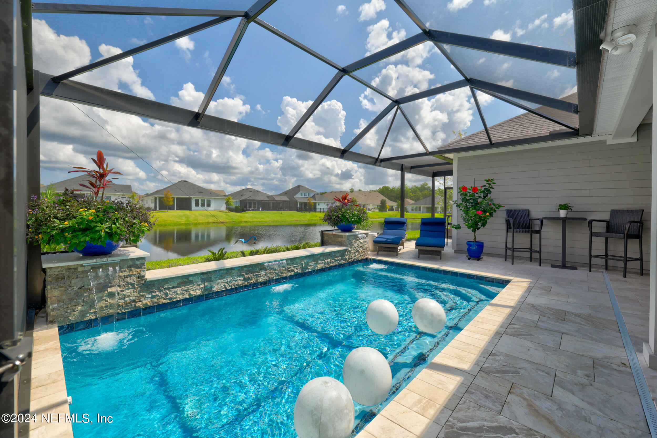 98 Sumter Pl Street St. Augustine, FL 32092 - Photo 43 of 84 a view of a swimming pool with a patio