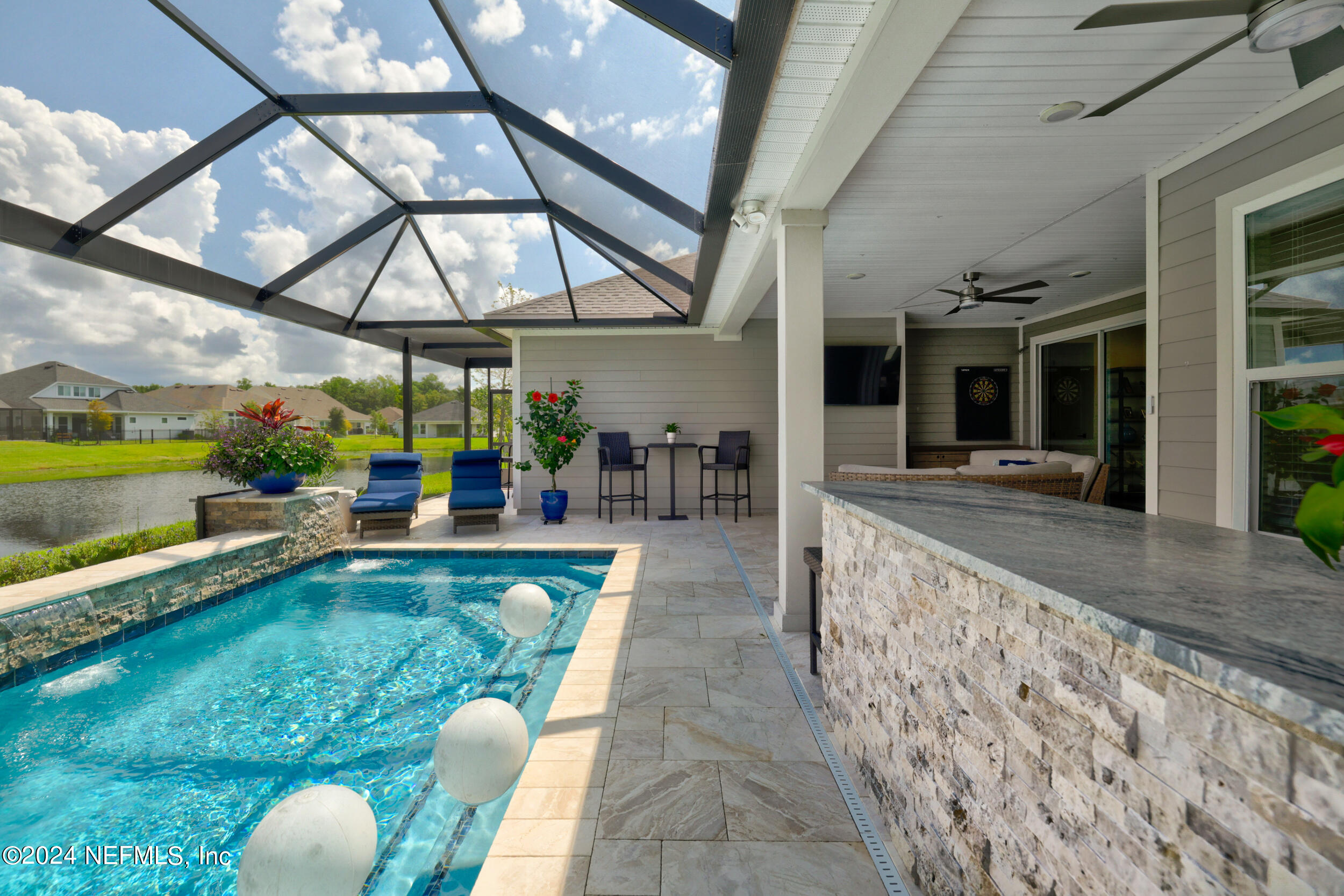 98 Sumter Pl Street St. Augustine, FL 32092 - Photo 44 of 84 a view of a swimming pool with a patio
