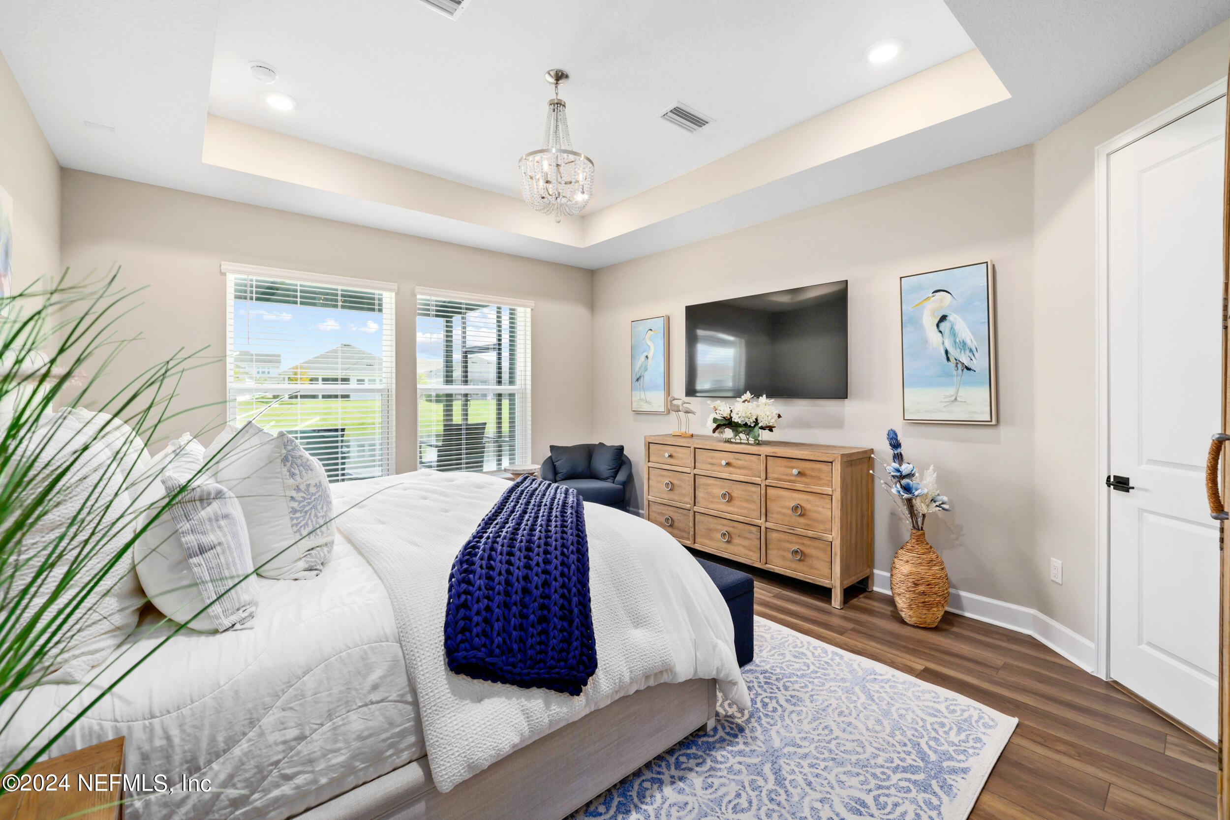 98 Sumter Pl Street St. Augustine, FL 32092 - Photo 55 of 84 a bedroom with a bed television on desk and a window
