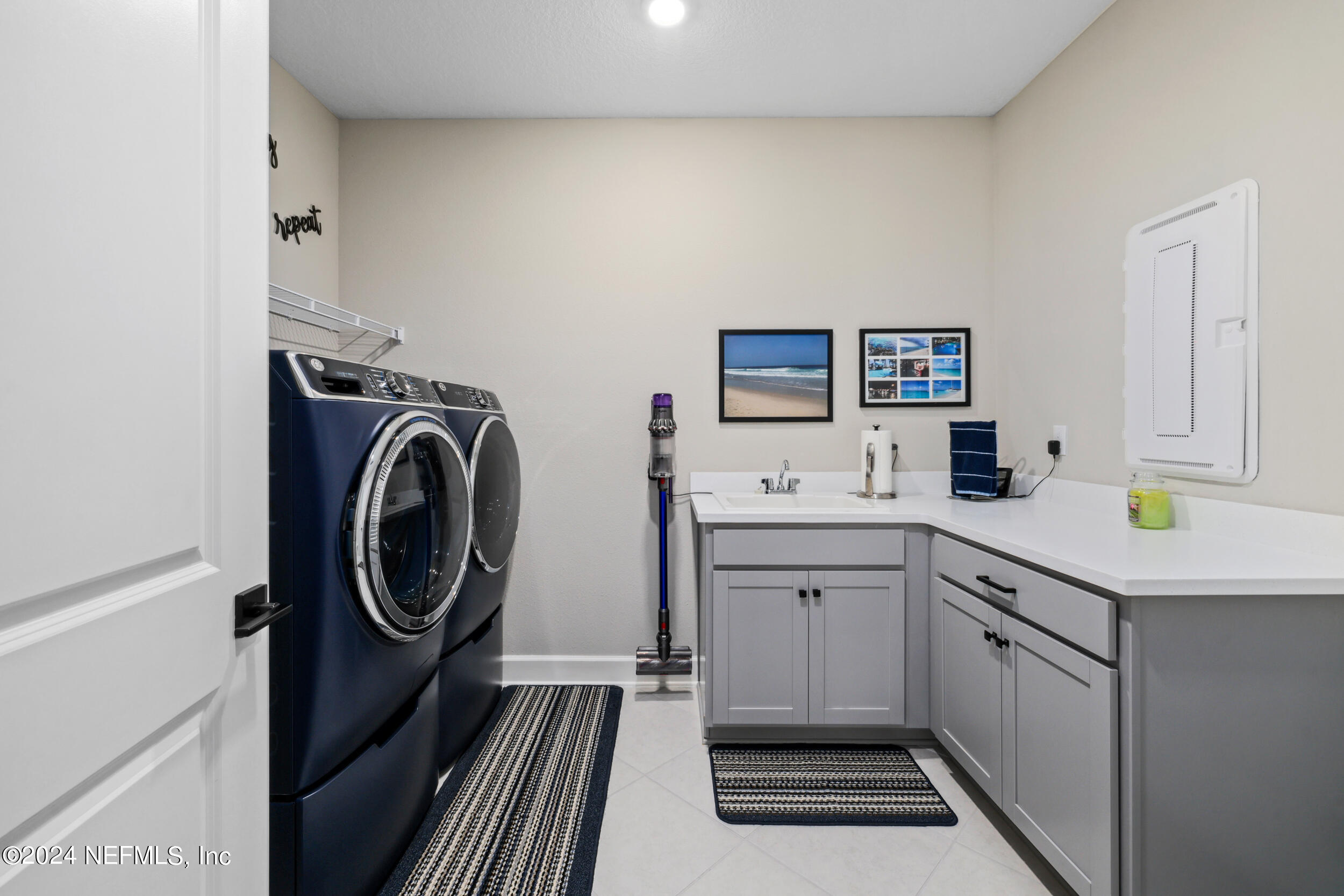 98 Sumter Pl Street St. Augustine, FL 32092 - Photo 67 of 84 a kitchen with a cabinets and white appliances