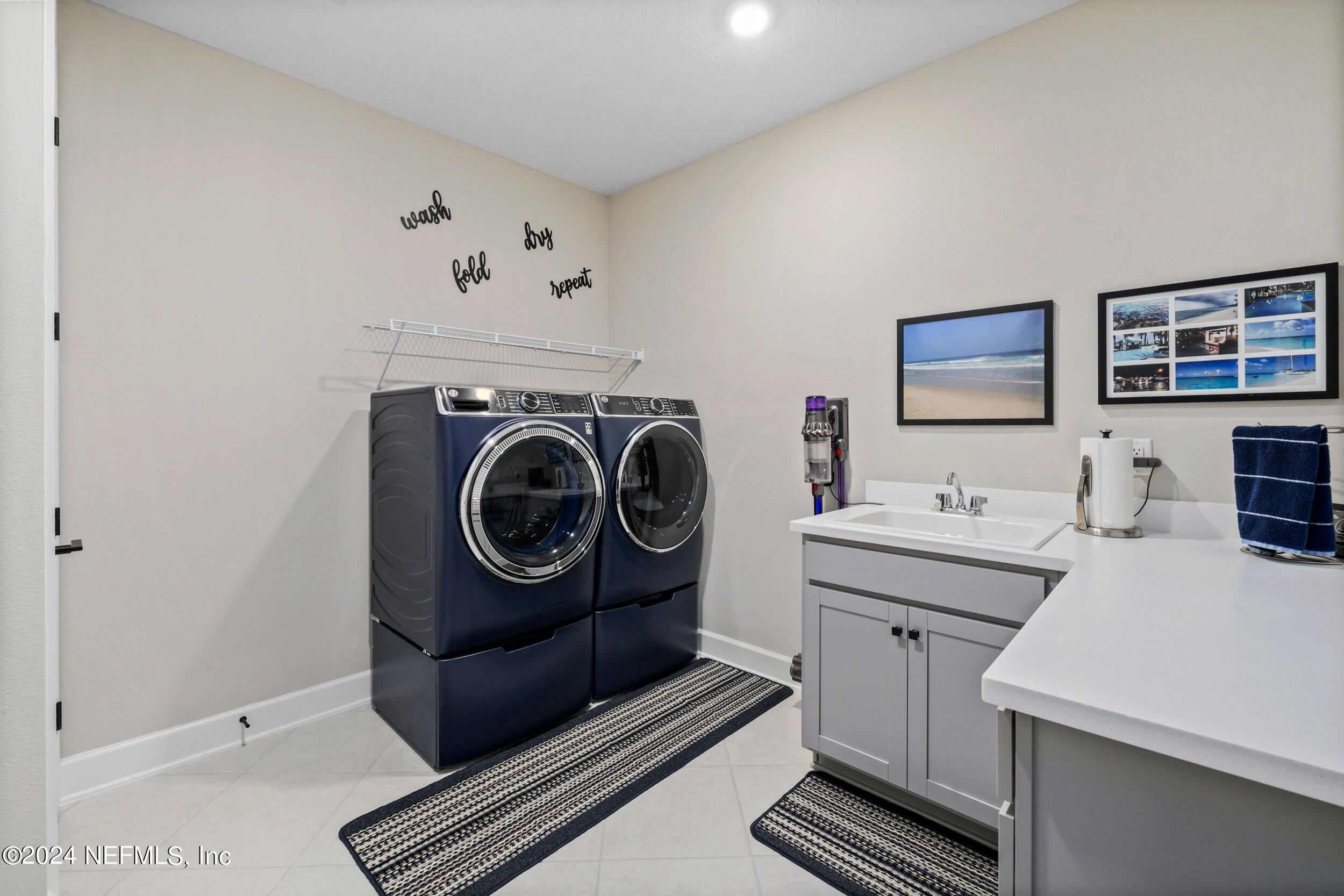 98 Sumter Pl Street St. Augustine, FL 32092 - Photo 69 of 84 a utility room with dryer and washer