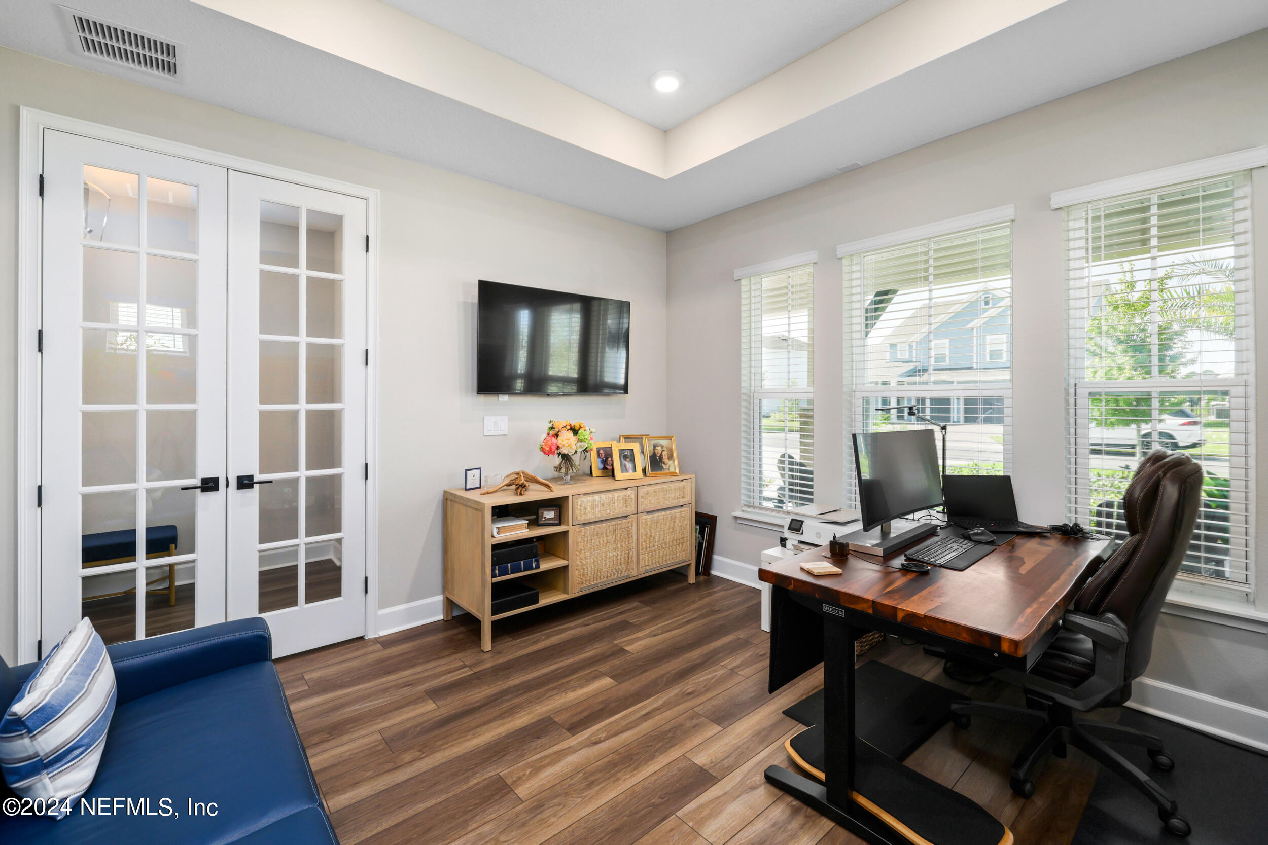 98 Sumter Pl Street St. Augustine, FL 32092 - Photo 7 of 84 a living room with furniture and a flat screen tv