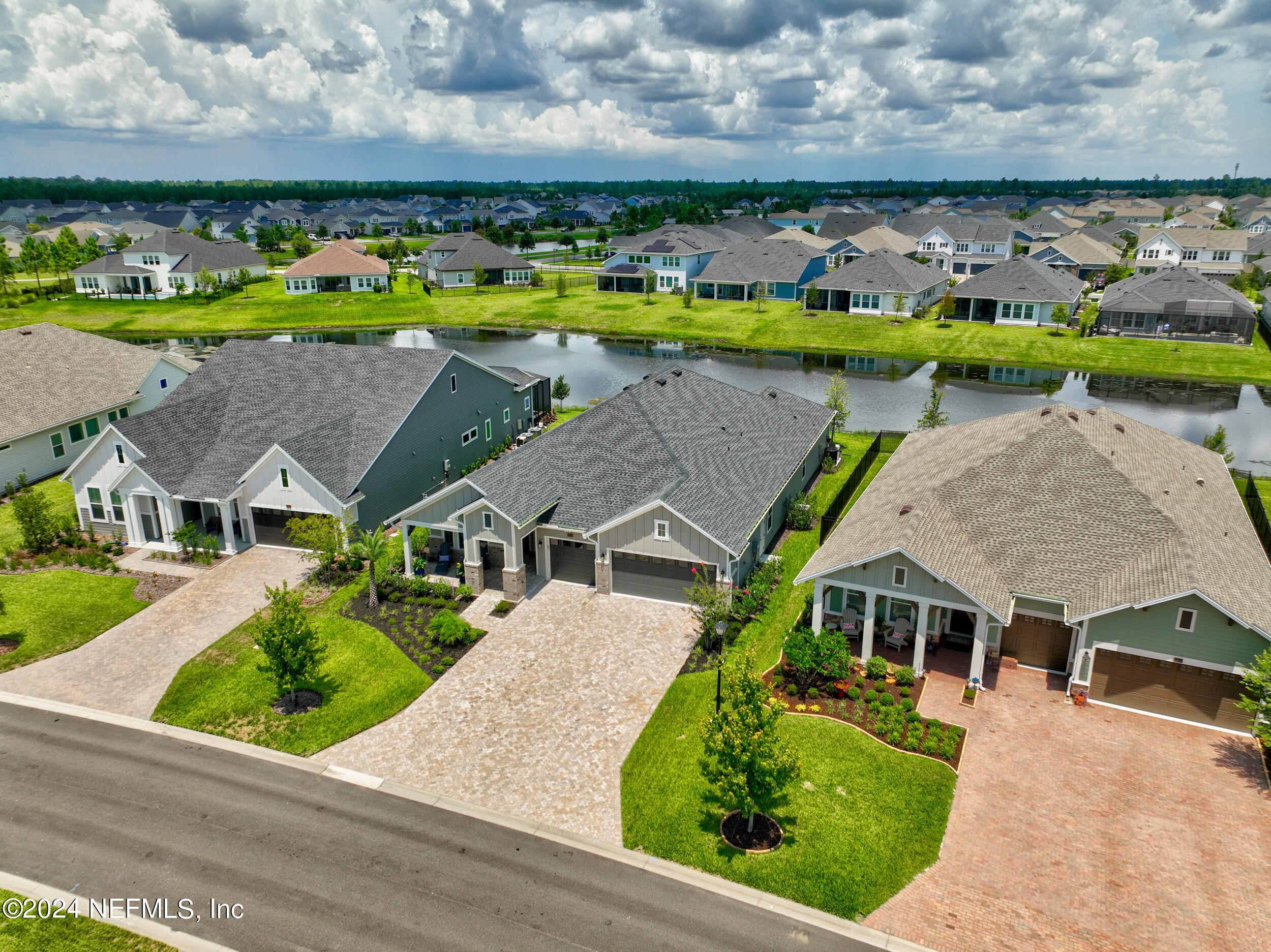 98 Sumter Pl Street St. Augustine, FL 32092 - Photo 75 of 84 an aerial view of a house with a garden and lake view