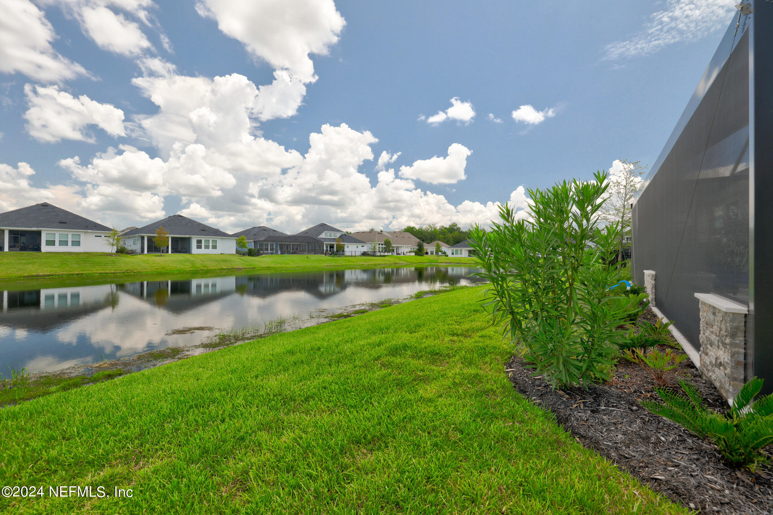 98 Sumter Pl Street St. Augustine, FL 32092 - Photo 78 of 84 a view of a lake with a big yard