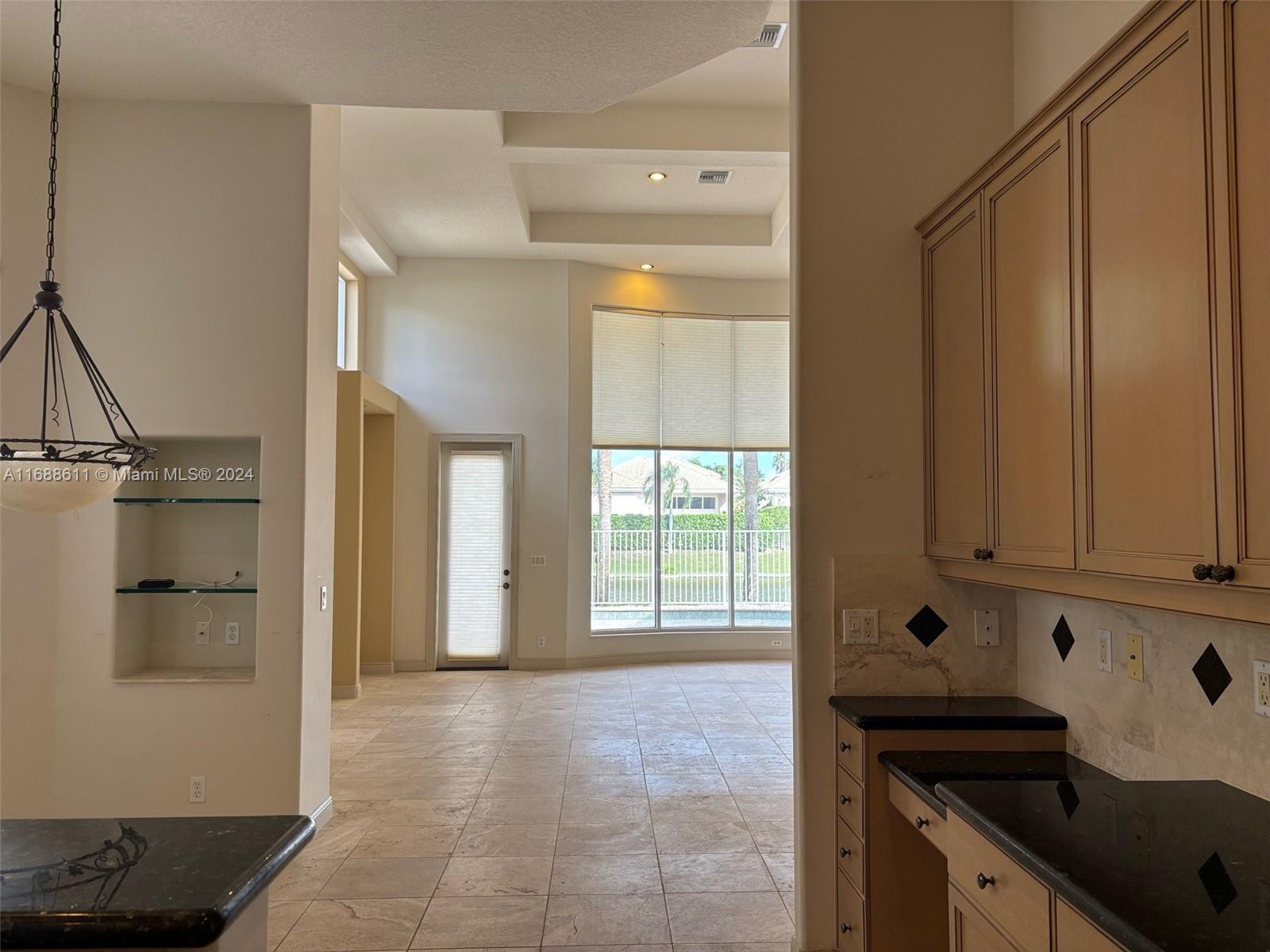 7091 Mallorca Crescent Boca Raton, FL 33433 - Photo 5 of 15 a view of a kitchen with a sink and cabinets