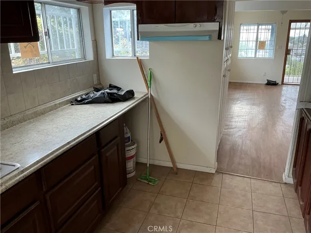 a view of a backyard with sitting area
